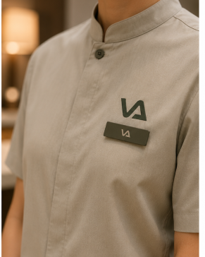 VAVABUY staff uniform — chest embroidery and name-tag patch